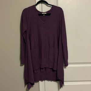 Women’s Cupio large long high-low sweater with accented purple sparkles.